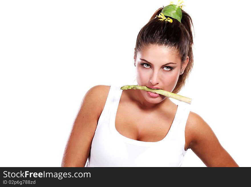 Woman with fresh rgeen asparagus in her mouth. Woman with fresh rgeen asparagus in her mouth