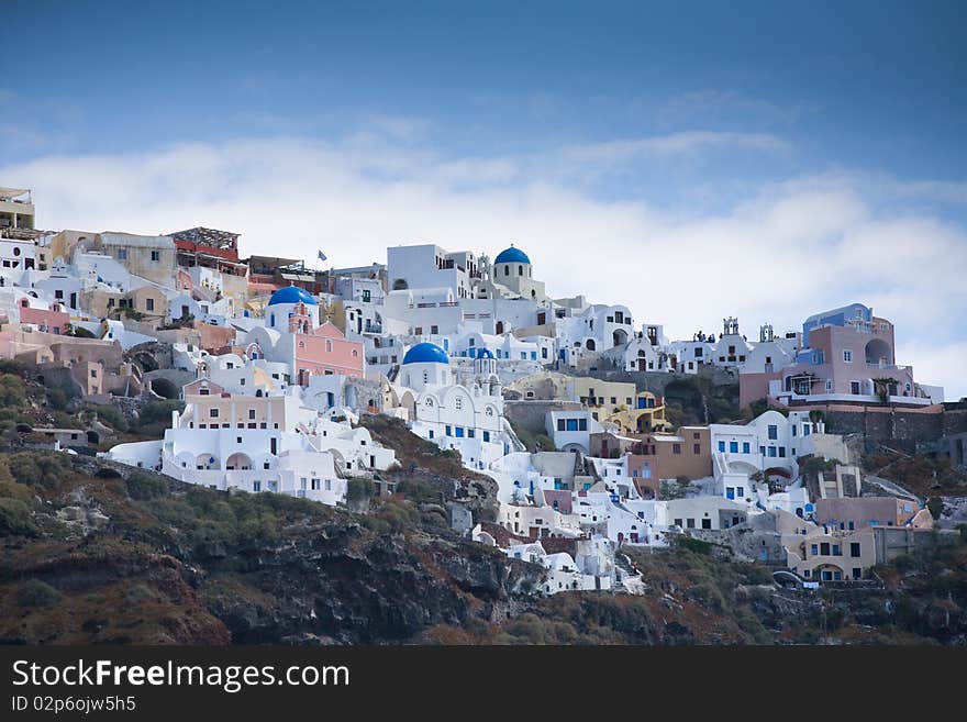 Santorini sky line with the classic blue and white building on show