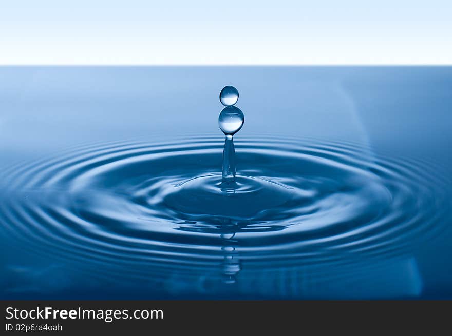 A drop collision in a water. A drop collision in a water