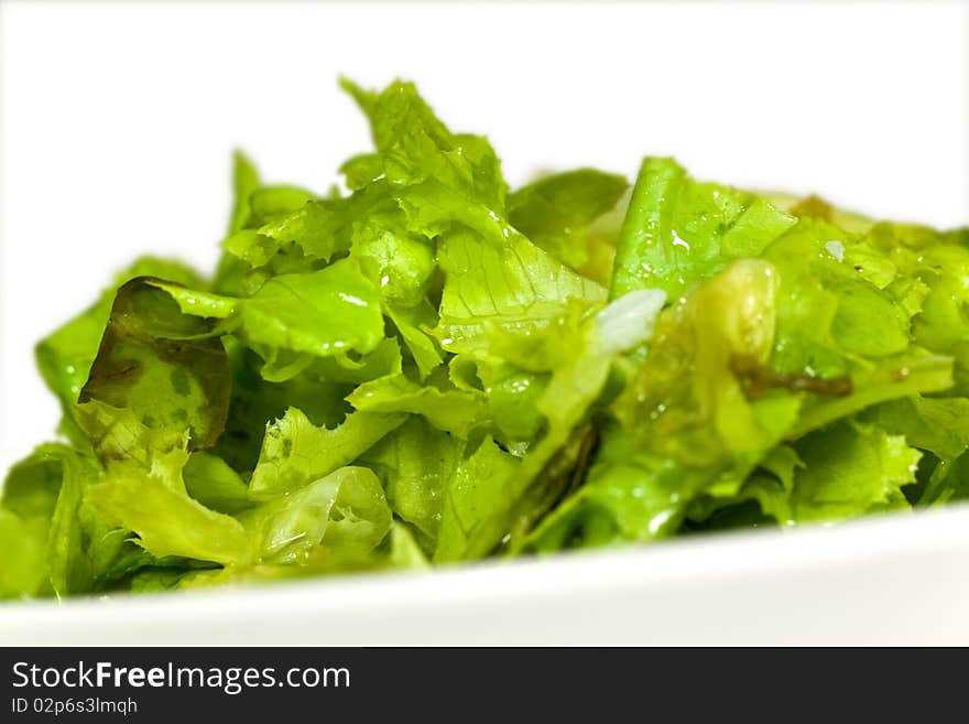 Leaf Of Lettuce On White Background. Isolated Over