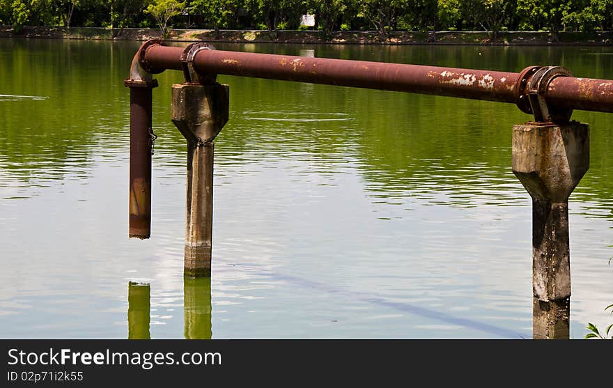 Drain old pipe water pond. Drain old pipe water pond