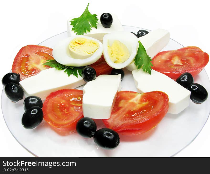 Mediterranean breakfast made of tomato cheese egg and olive