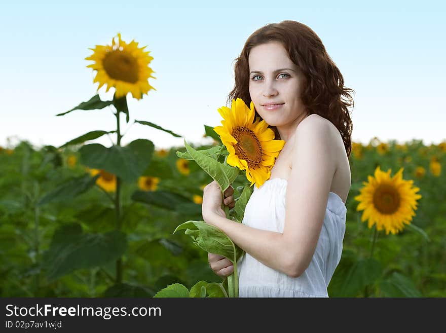 Young beauty woman on sea under sky