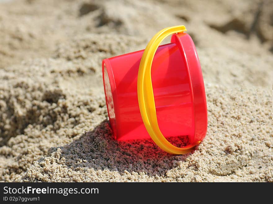 Toys left lying in the sand