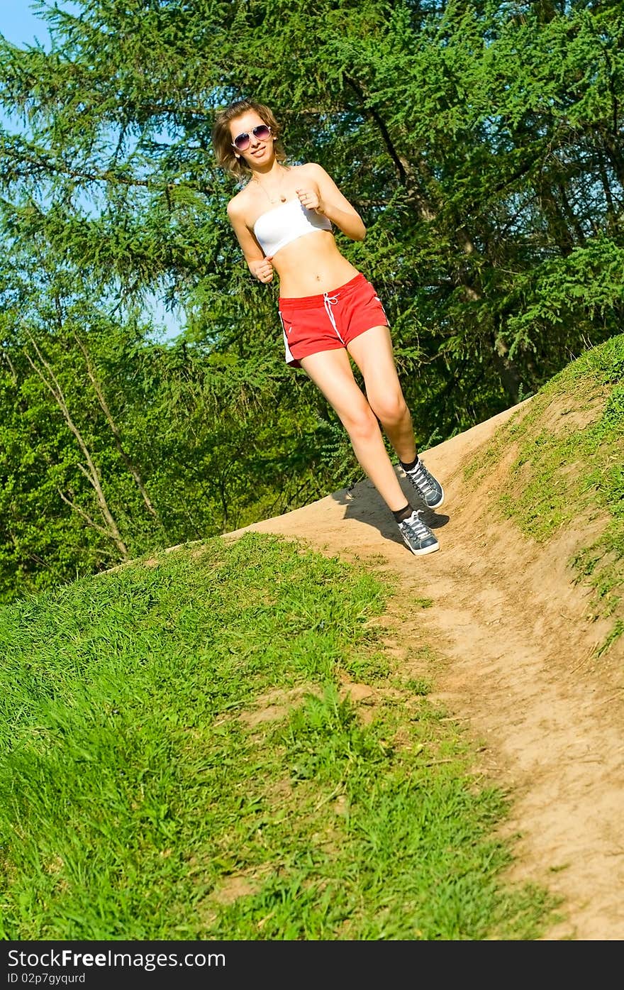 Pretty girl jogging