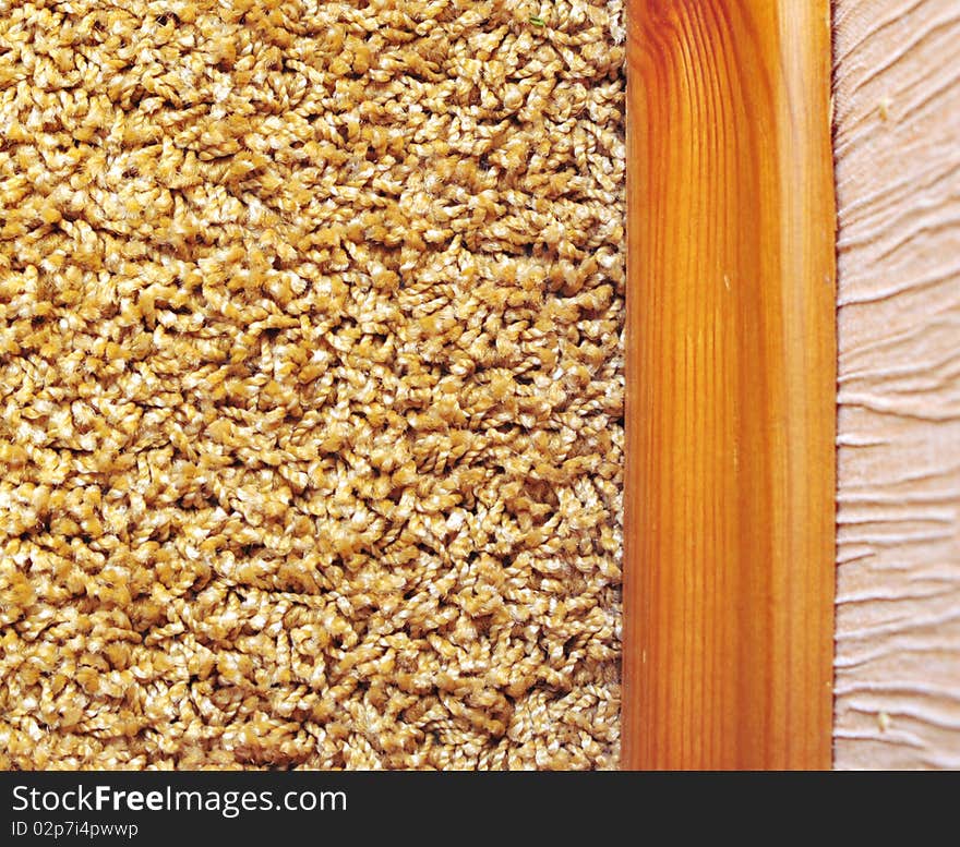 Plinth on between a carpet and wall-paper. Plinth on between a carpet and wall-paper