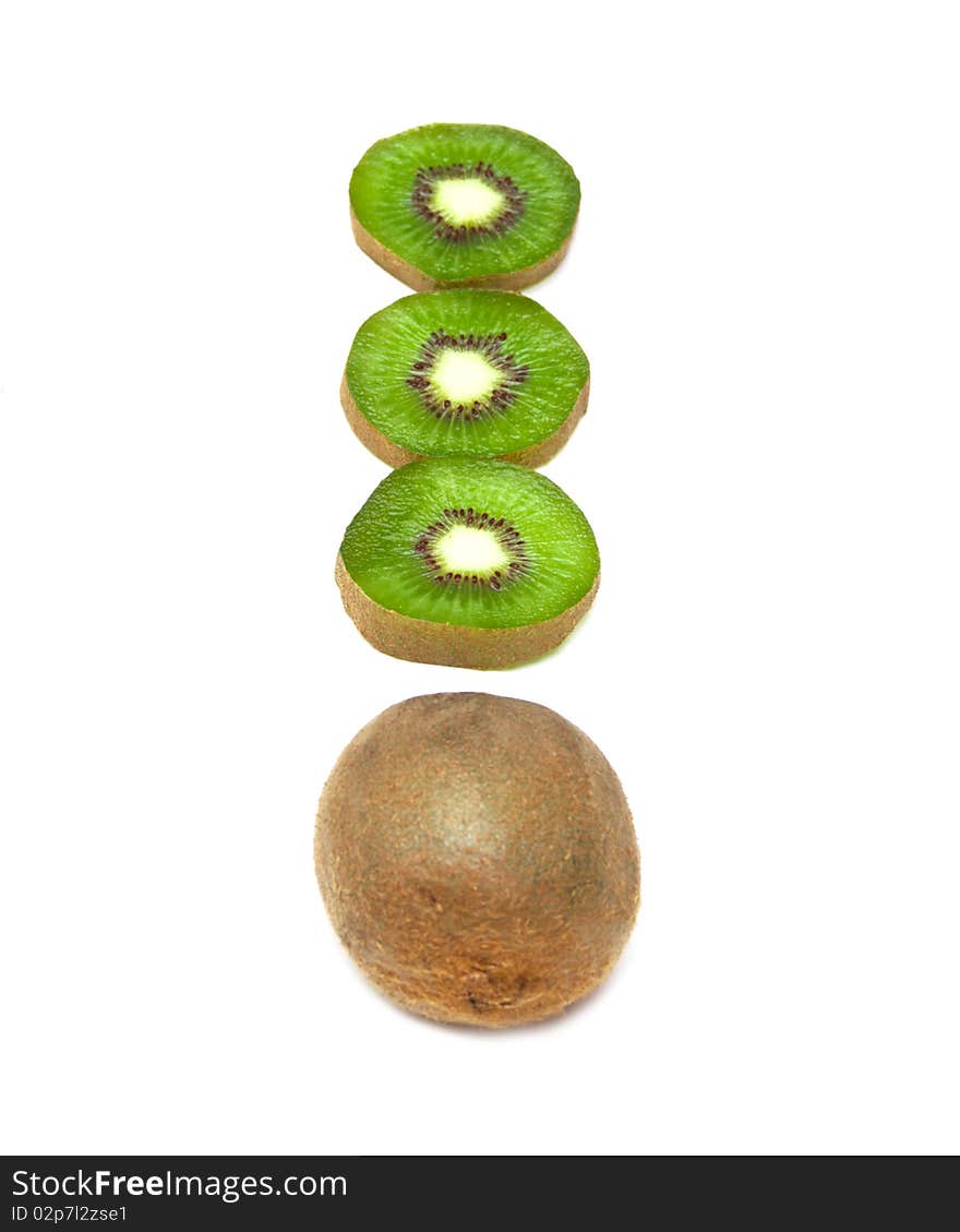 Segments of juicy fruit kiwi in the form of exclamation mark