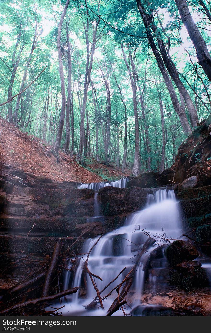 Soft Waterfall In The Forest