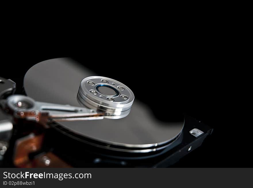 Open hard disk drive closeup. Open hard disk drive closeup