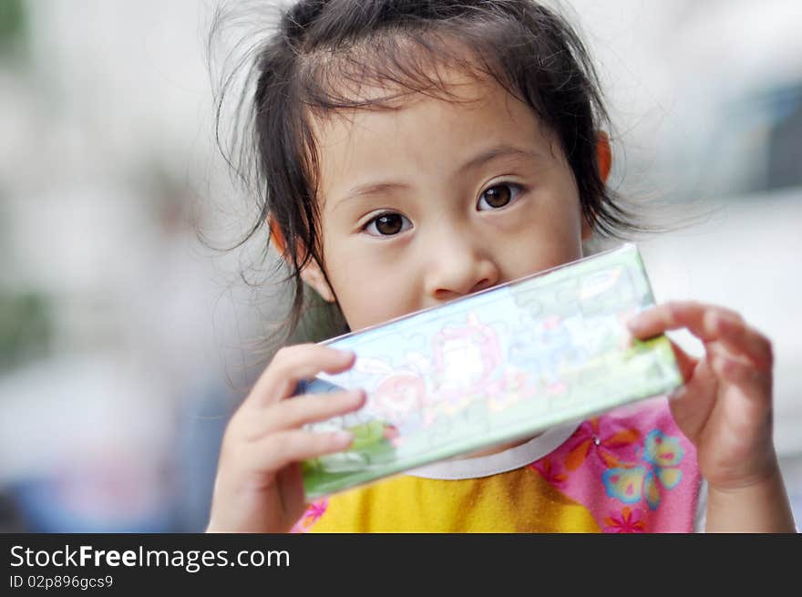 A lovely Chinese girl，who is looking at camera