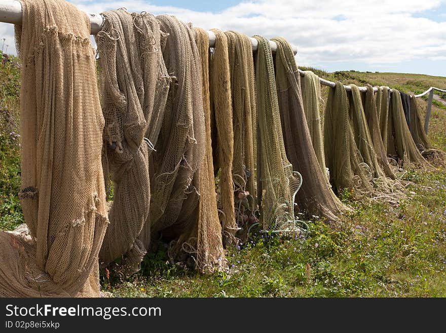 Fishing networks to dry on wooden rack