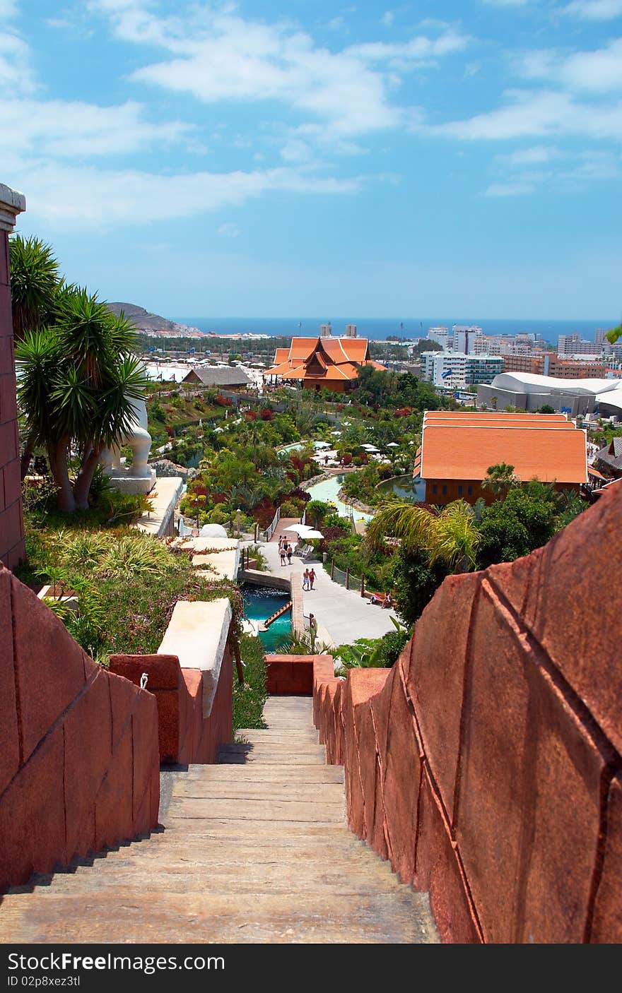 A stone staircase with cityscape and ocean view. Tenerife, Canaries.