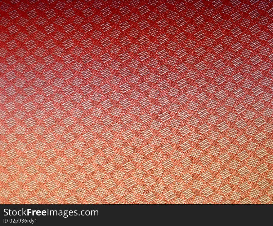 Texture of red fabric background closeup