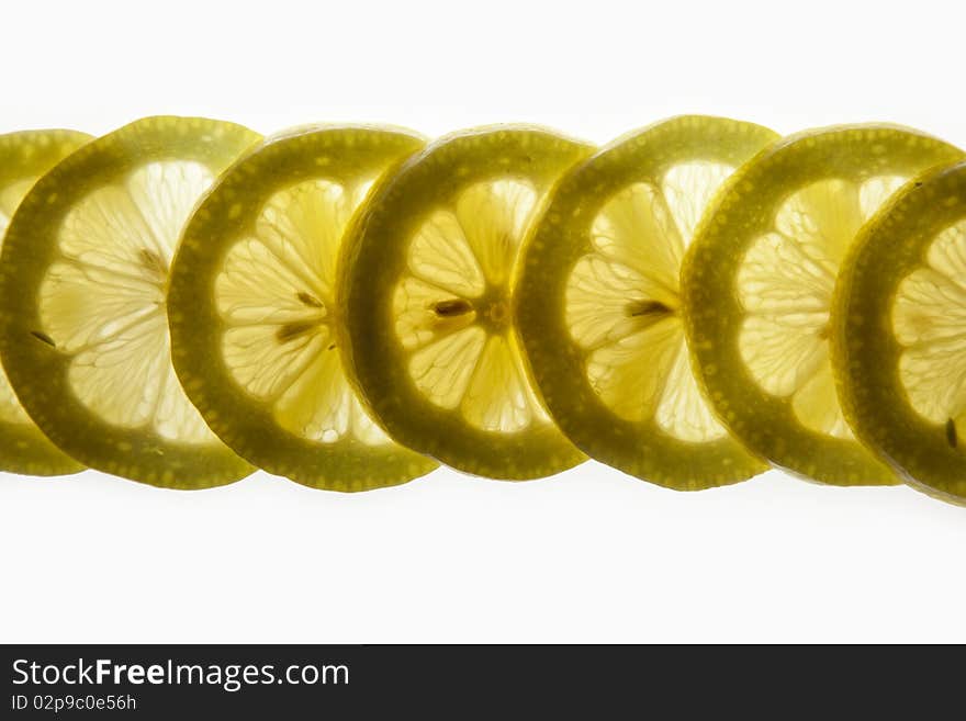 Lemon slices isolated on white background