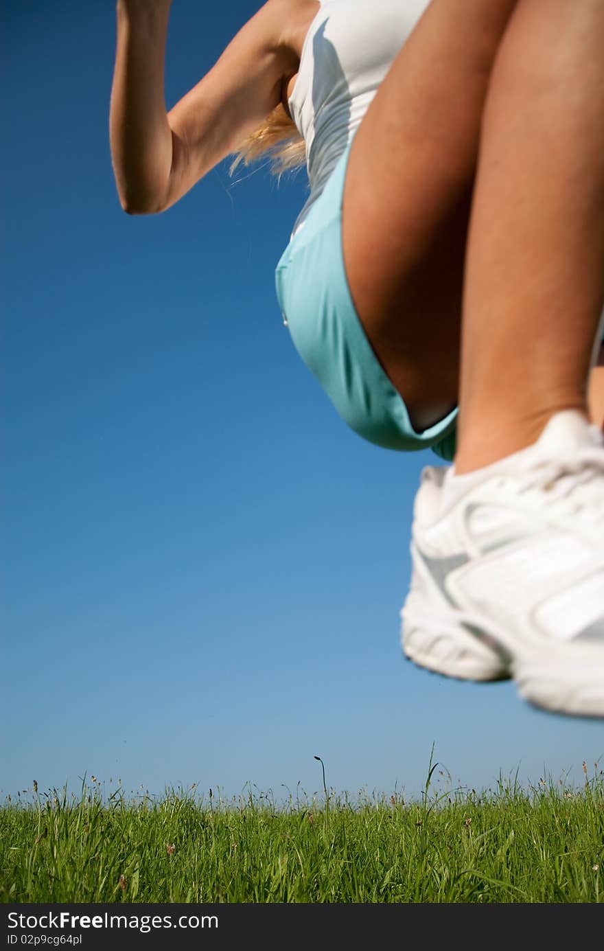 Young woman jumping