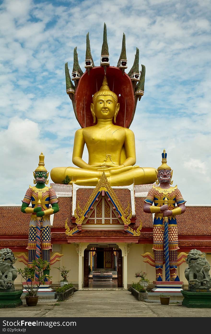 Large golden Buddha Image with its two giant front