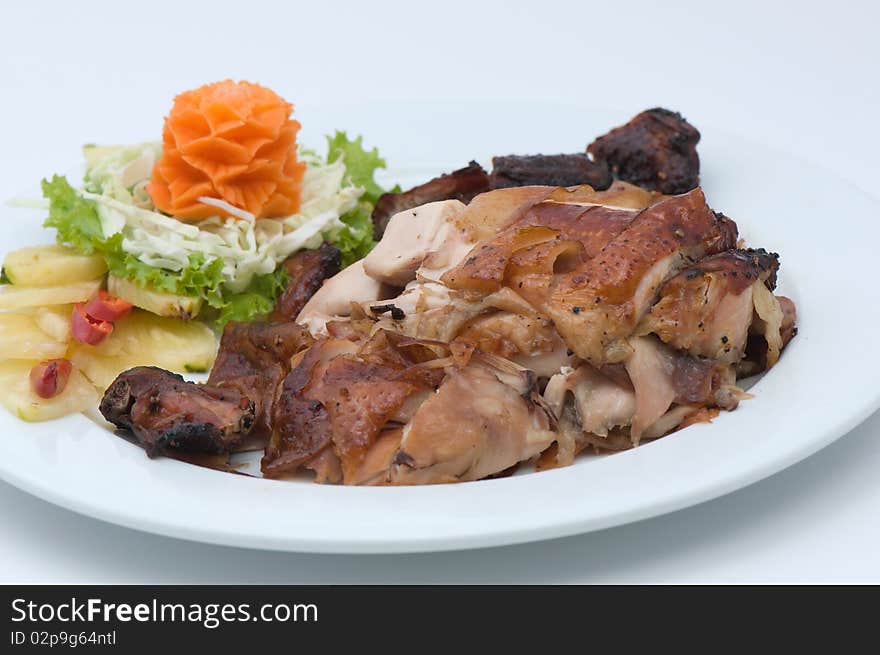 Roasted chicken decorate with carrot and vegetable