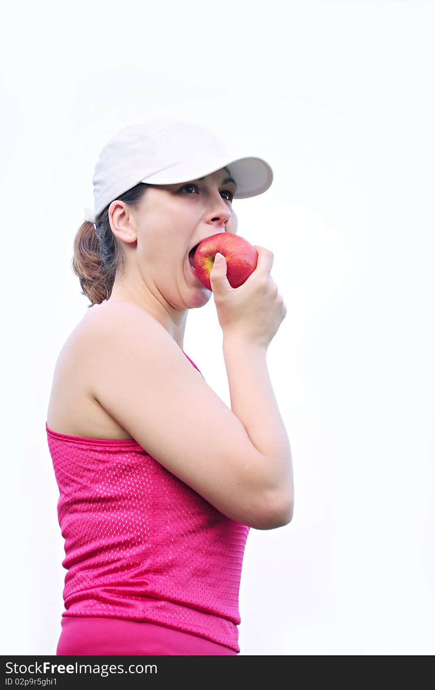 Girl after recreation in the countryside and eating an apple. Girl after recreation in the countryside and eating an apple