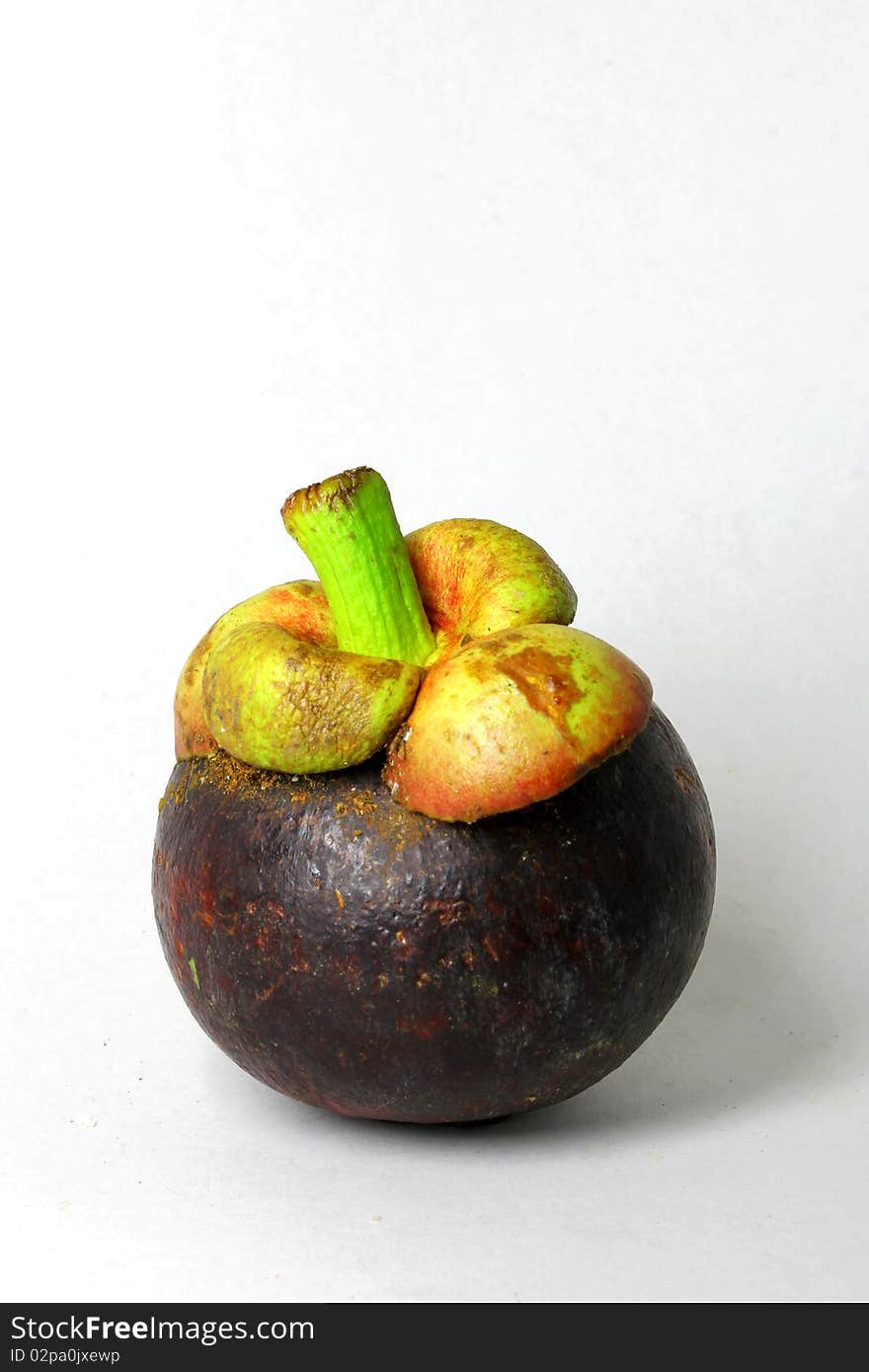 Tropical fruit - Mangosteen (Garcinia mangostana)on white background