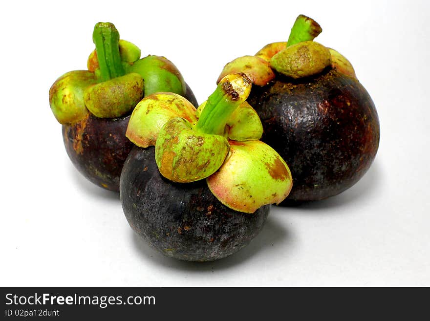 Tropical fruit - Mangosteen (Garcinia mangostana)on white background