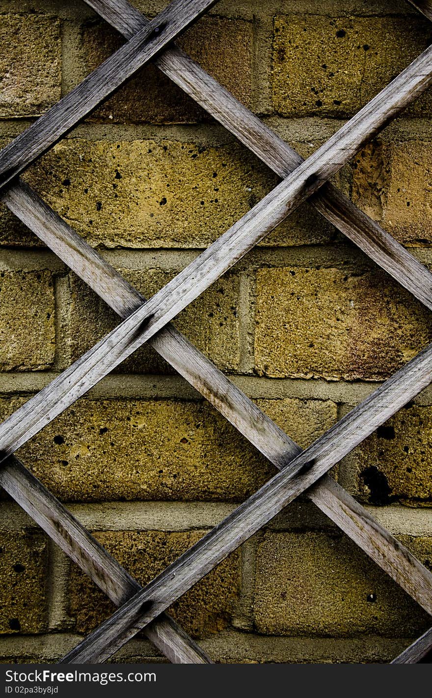 Abstract brick wall with old wood graph covering. Abstract brick wall with old wood graph covering