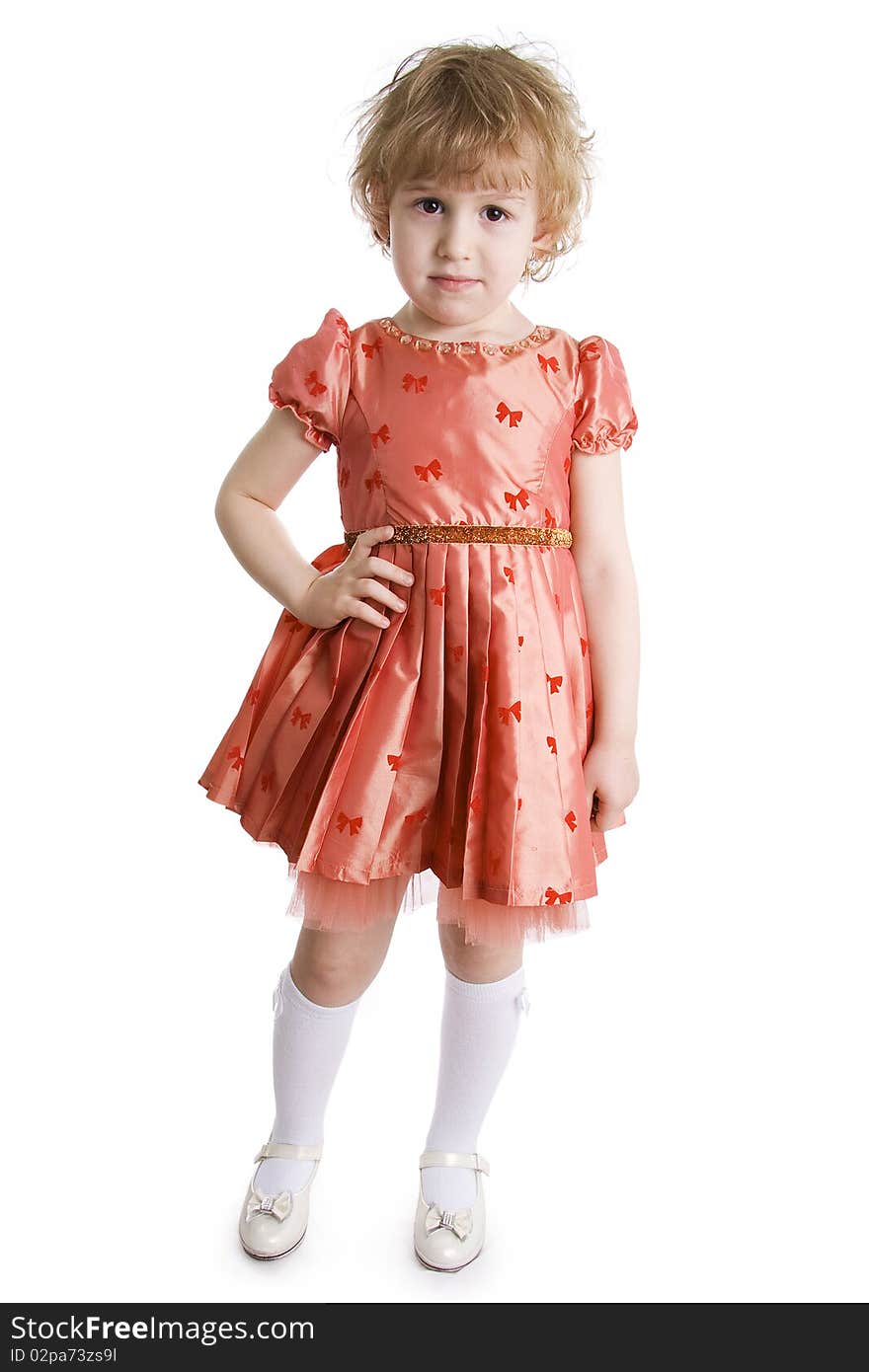 The little girl in dressing-up dress full Length. On a white background. The little girl in dressing-up dress full Length. On a white background.