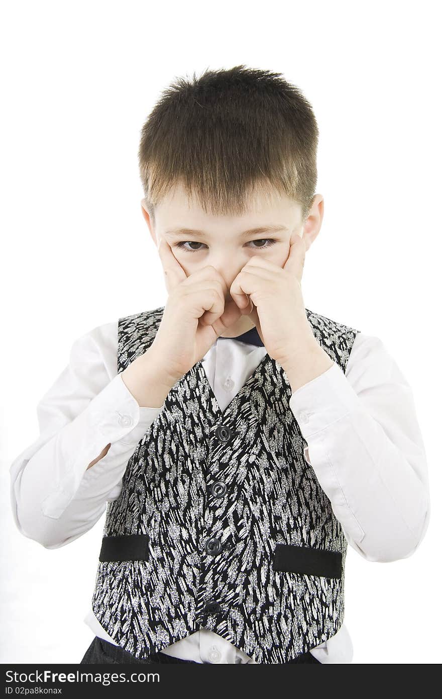 Serious boy standing on white background. Serious boy standing on white background