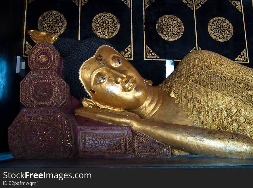 Gold buddha image in thai temple