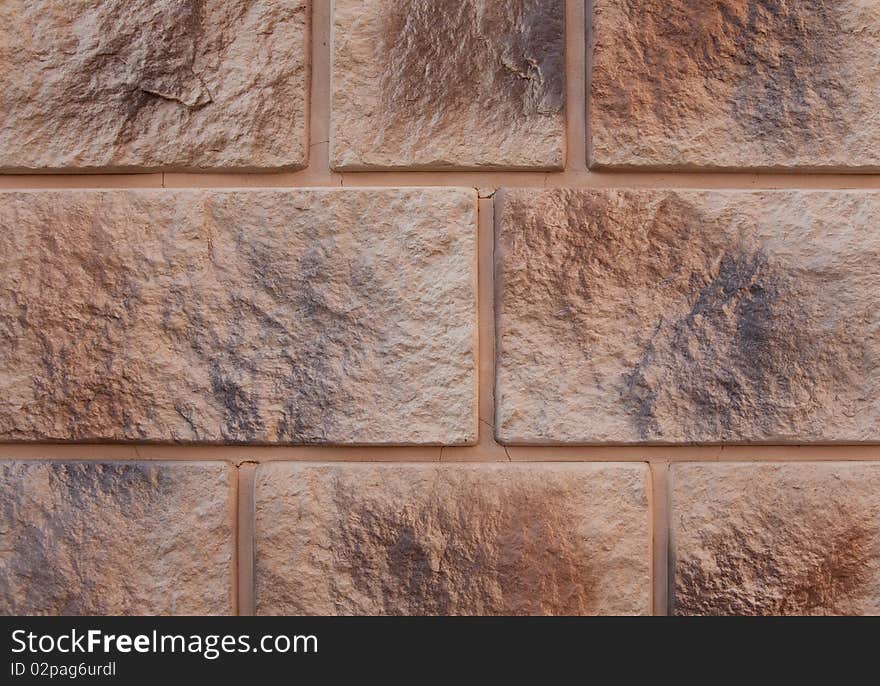 Brick wall, uneven staining, background. Brick wall, uneven staining, background