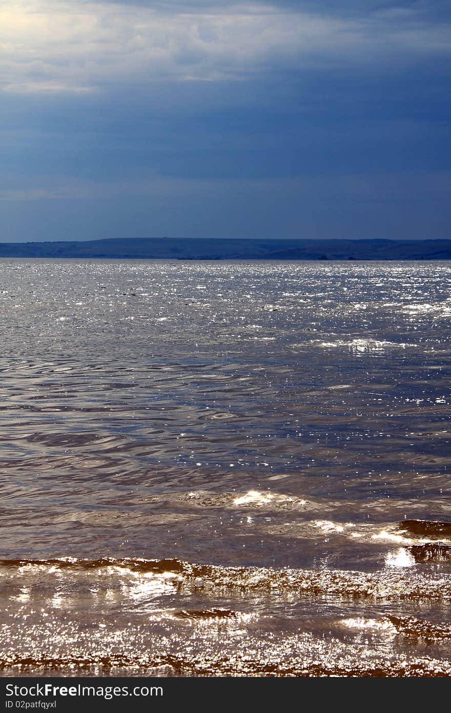 River, beach and cloudy weather. River, beach and cloudy weather