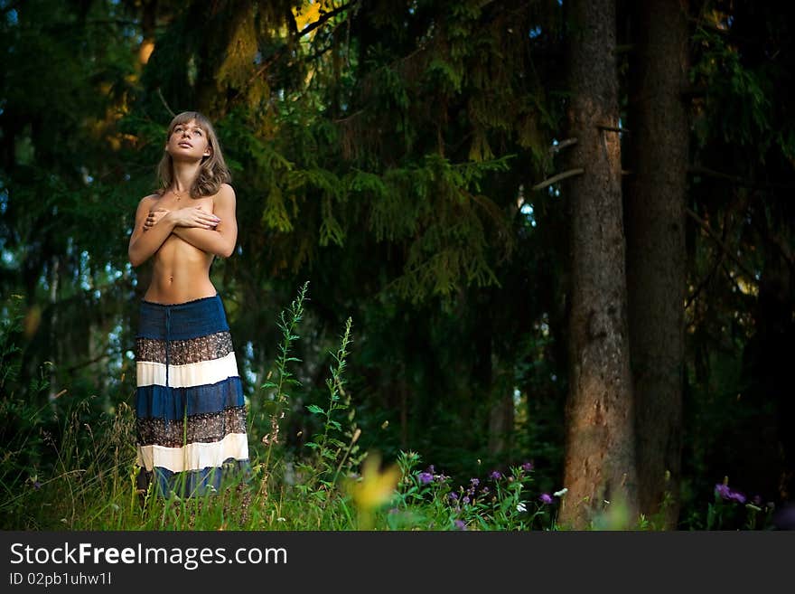 Portrait of attractive girls on the nature of the grass