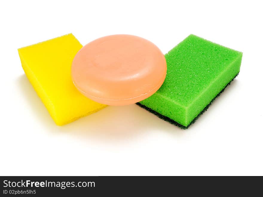 Soap and two washcloths on a white background