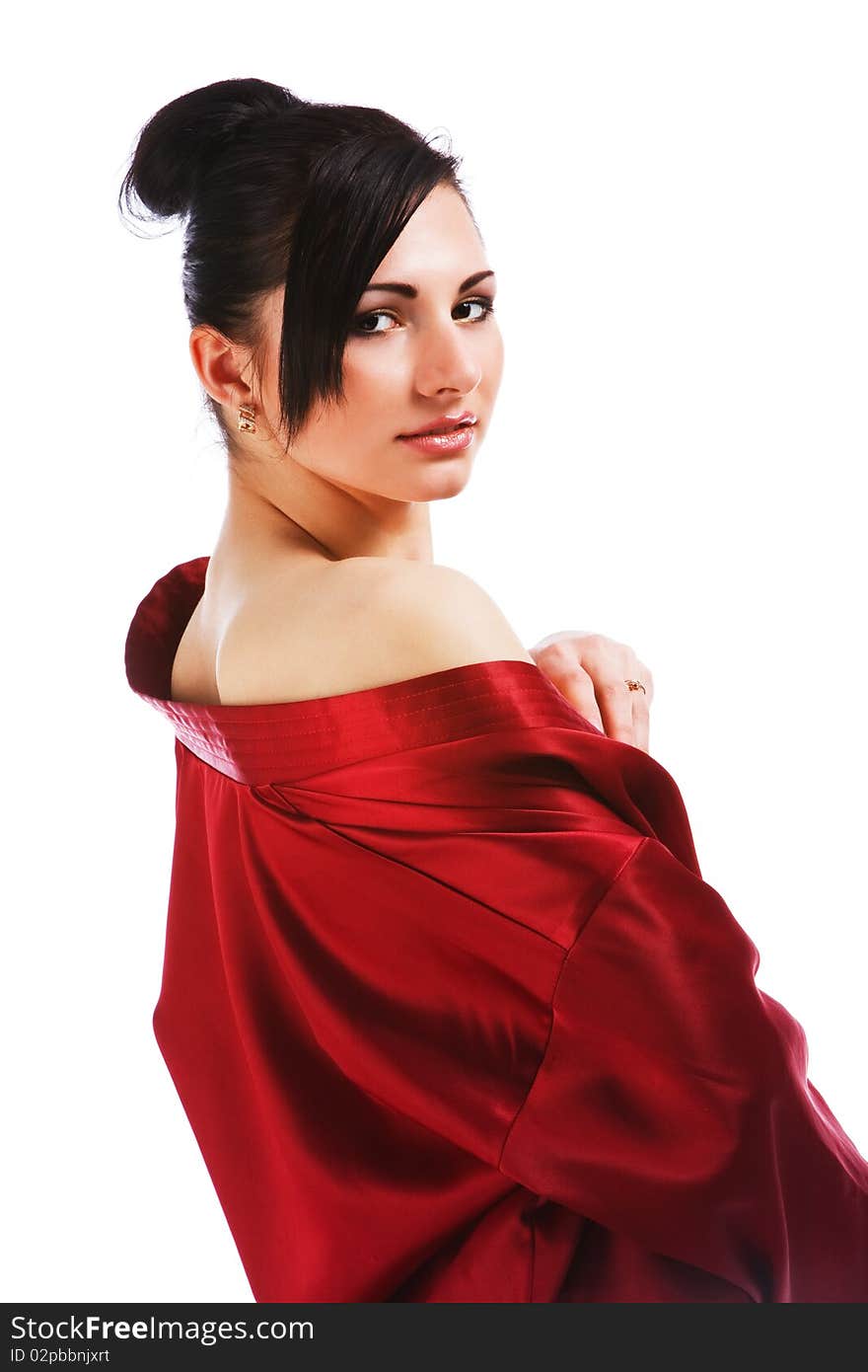 Picture of charming young woman in red gown on white background.