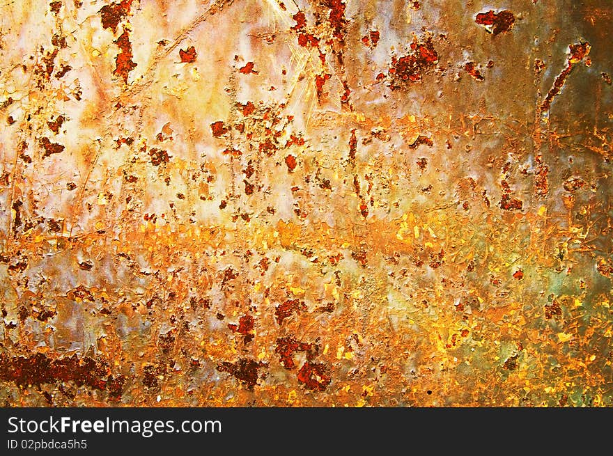 Oxidized metal sheet covered with old paint