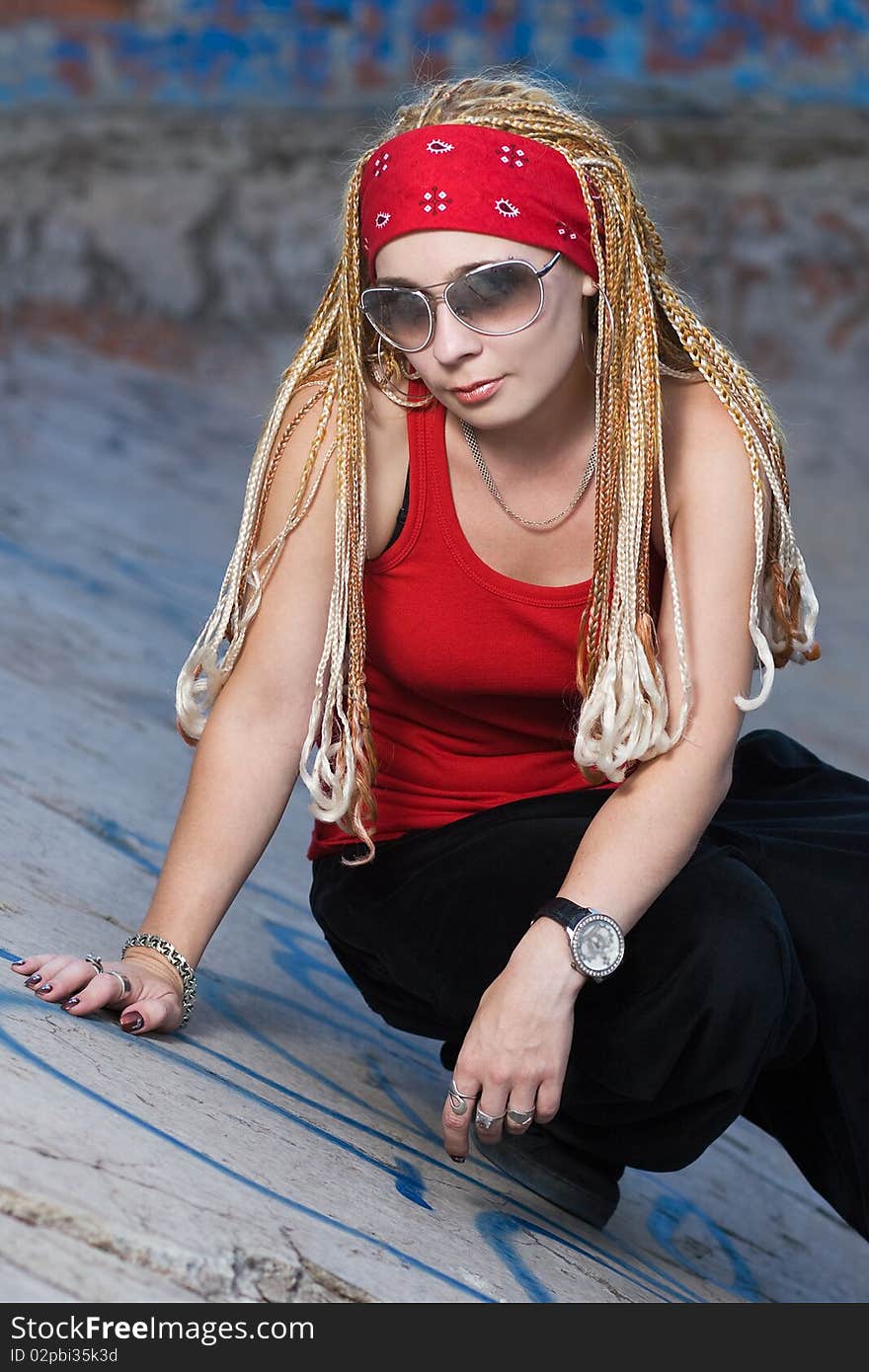 Late teenage girl with braids posing outdoors. Late teenage girl with braids posing outdoors