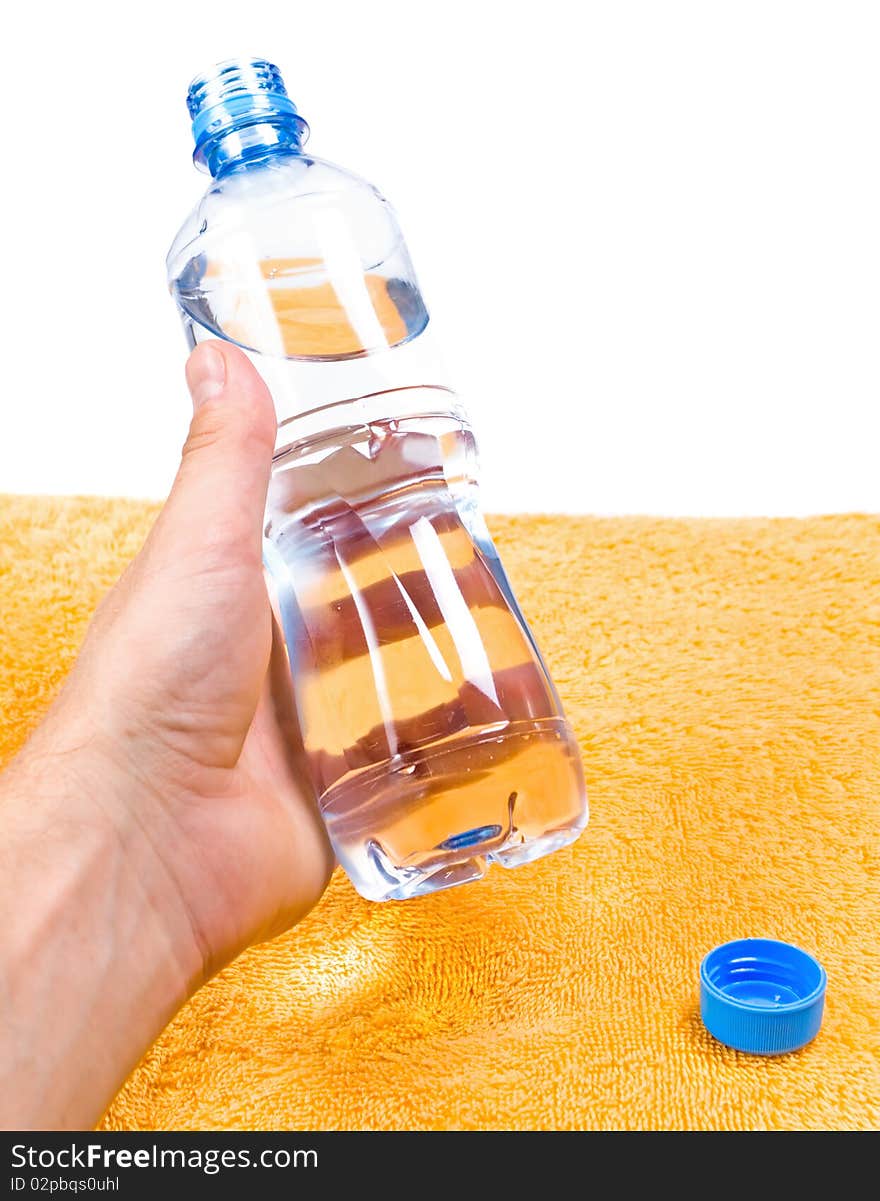 Man holding water in bottle