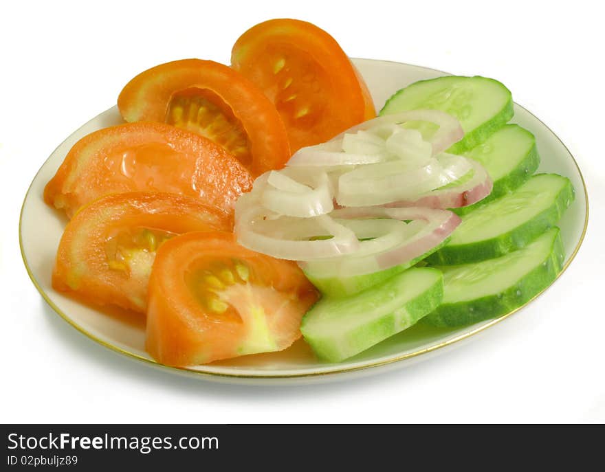 Tomatoes, Cucumbers, Onions On A Saucer