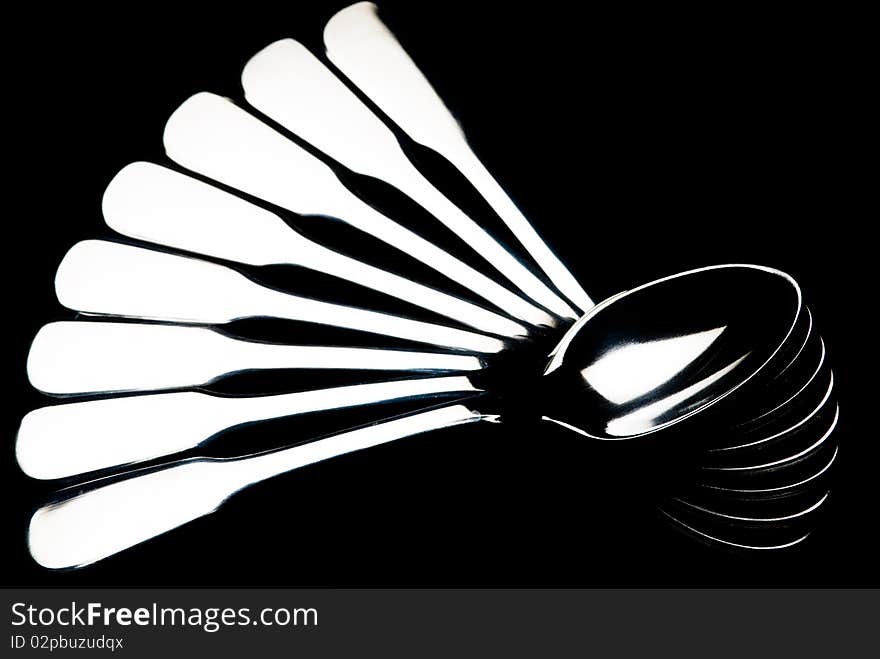 Teaspoons Arranged In Fan Shape