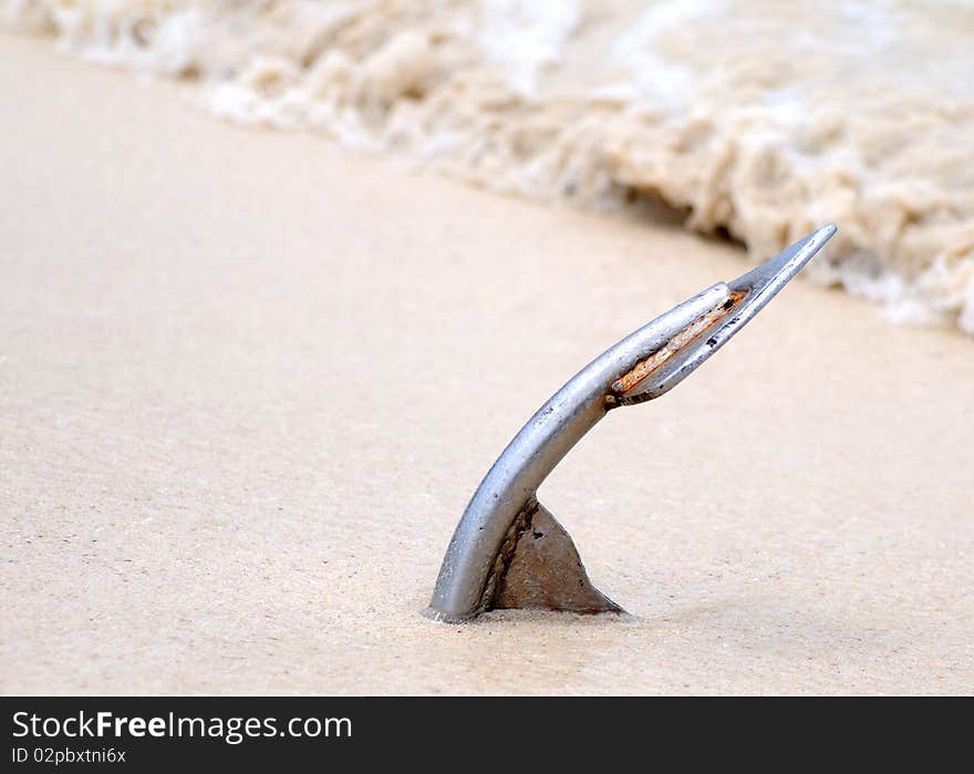 Anchor on the sand beach