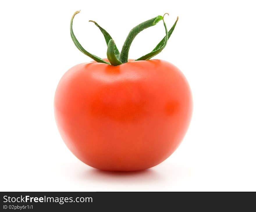 Red tomato isolated on white background.