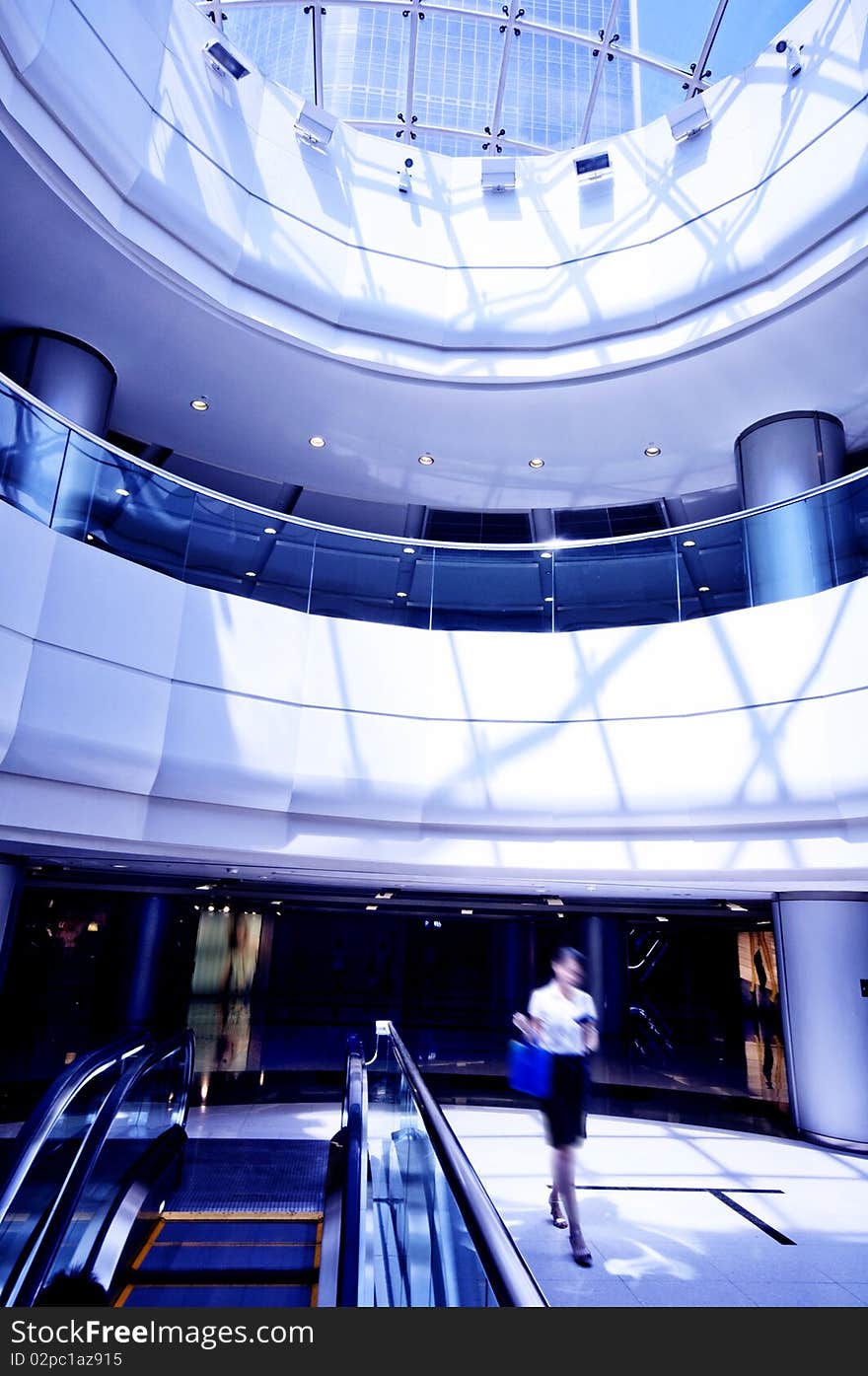 Escalator inside in the building. Escalator inside in the building