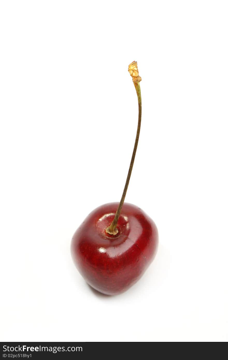 Fresh sweet cherry isolated over white background