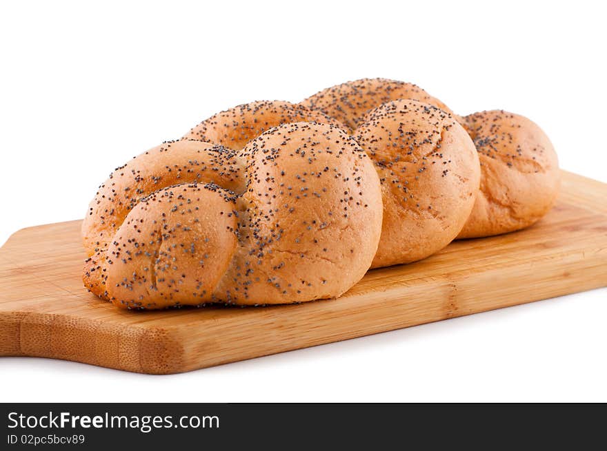 Bread roll with poppy white background. Bread roll with poppy white background.