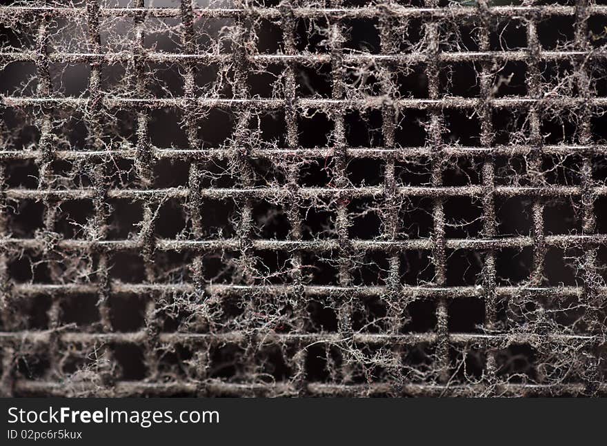 Black Old grungy speaker holes. Texture. Dusty.