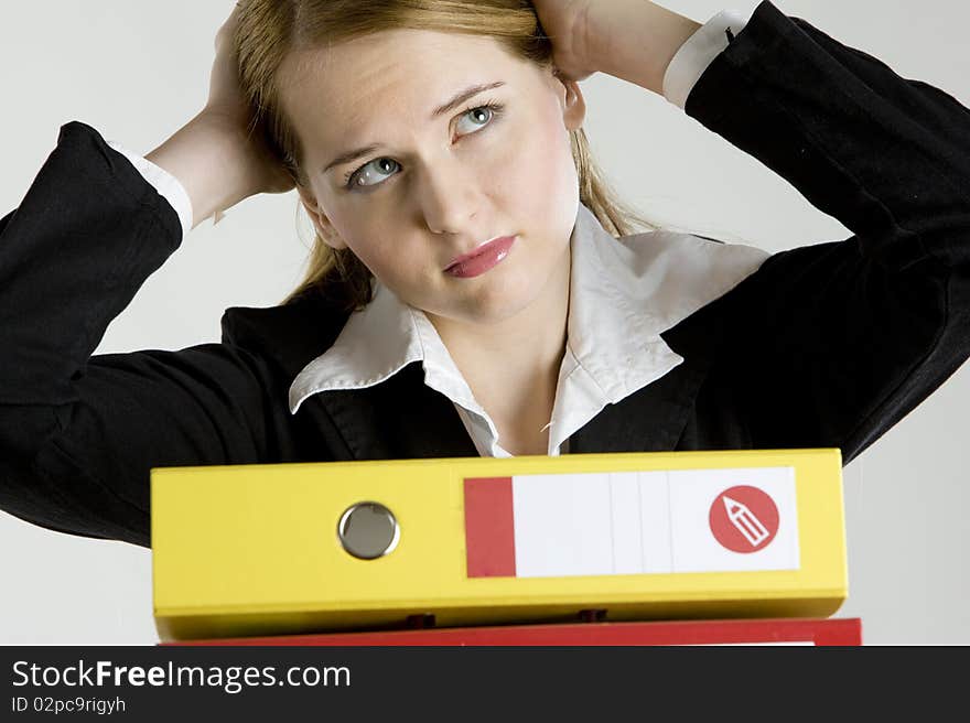 Portrait of businesswoman with folders