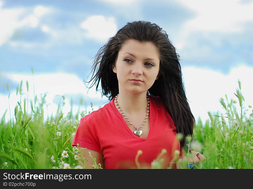 Beautiful girl in a field