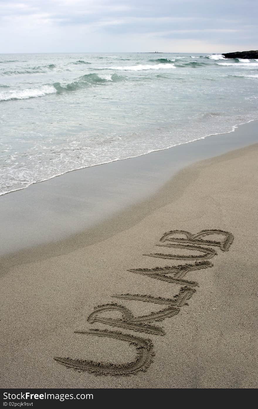 Logo in german on norwegian beach. Logo in german on norwegian beach