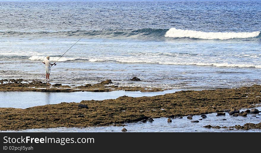 Angler at the coast of Tenerife