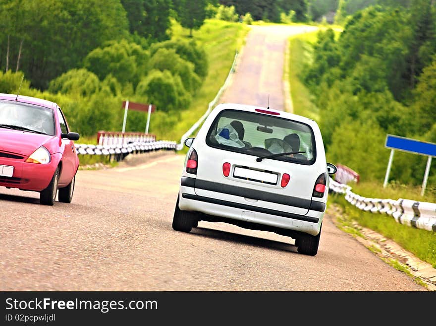 Cars on a dangerous bend in the road