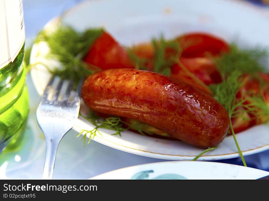 Grilled sausages on a plate